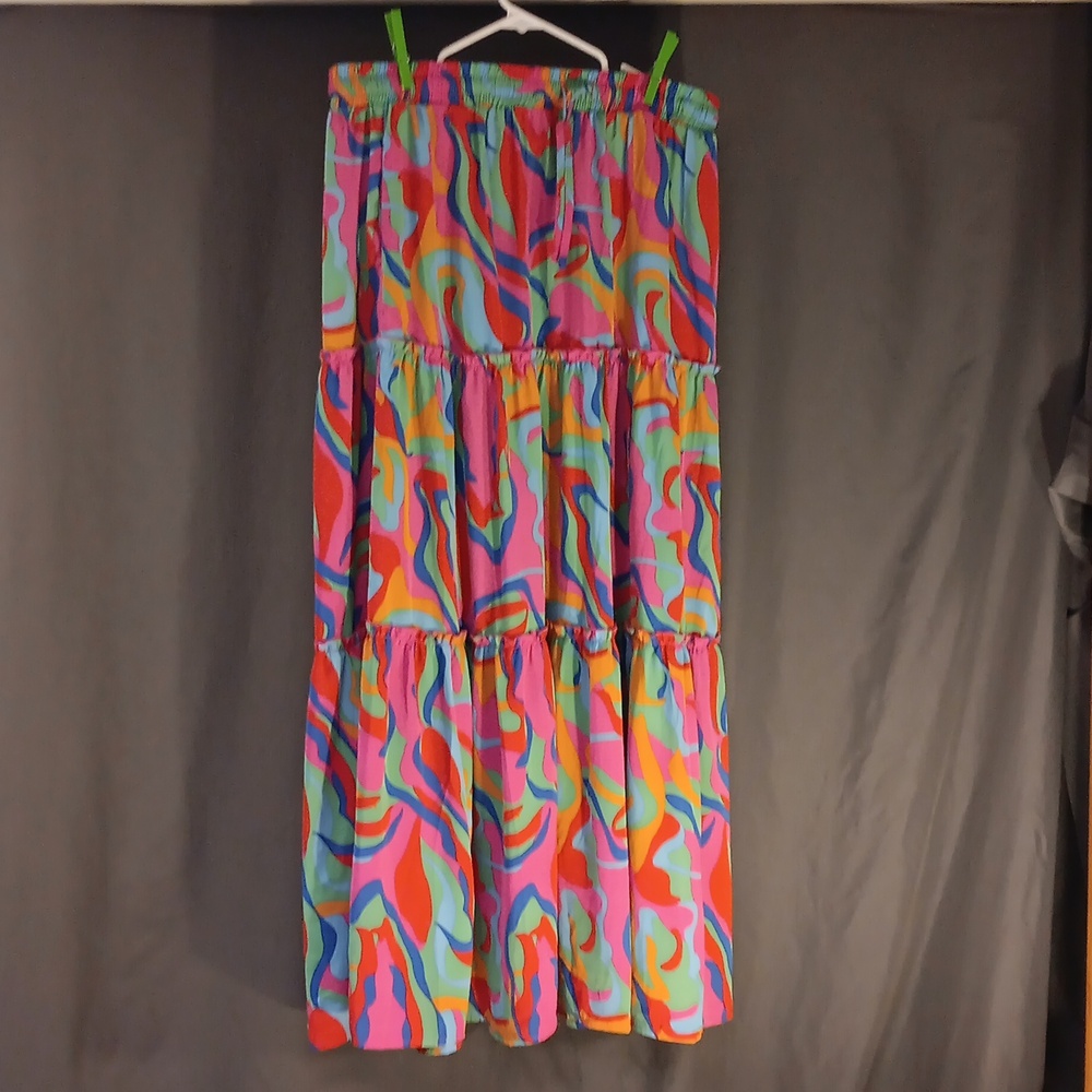 Never worn (tags removed) long, very colorful skirt.